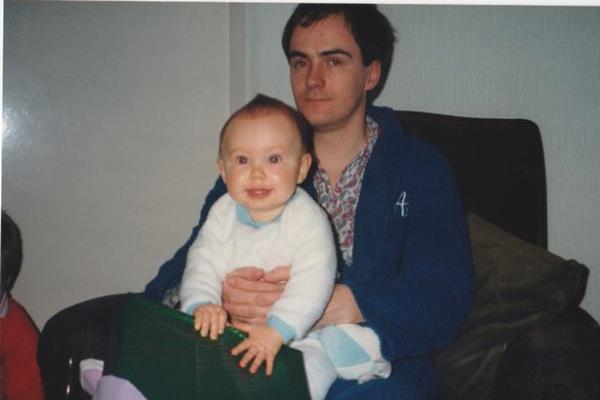 Lewis as a baby with his father Jeff